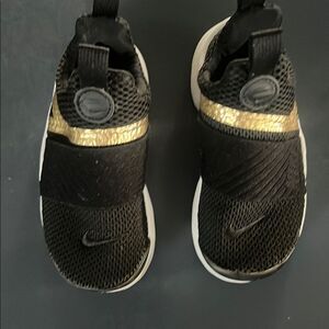 Nike Kids Black and Gold Shoes